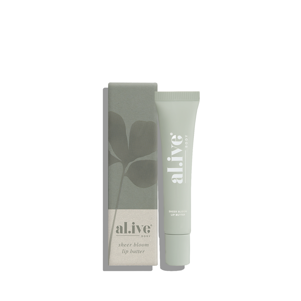 Tube of 'alive' lip butter with packaging on a white background