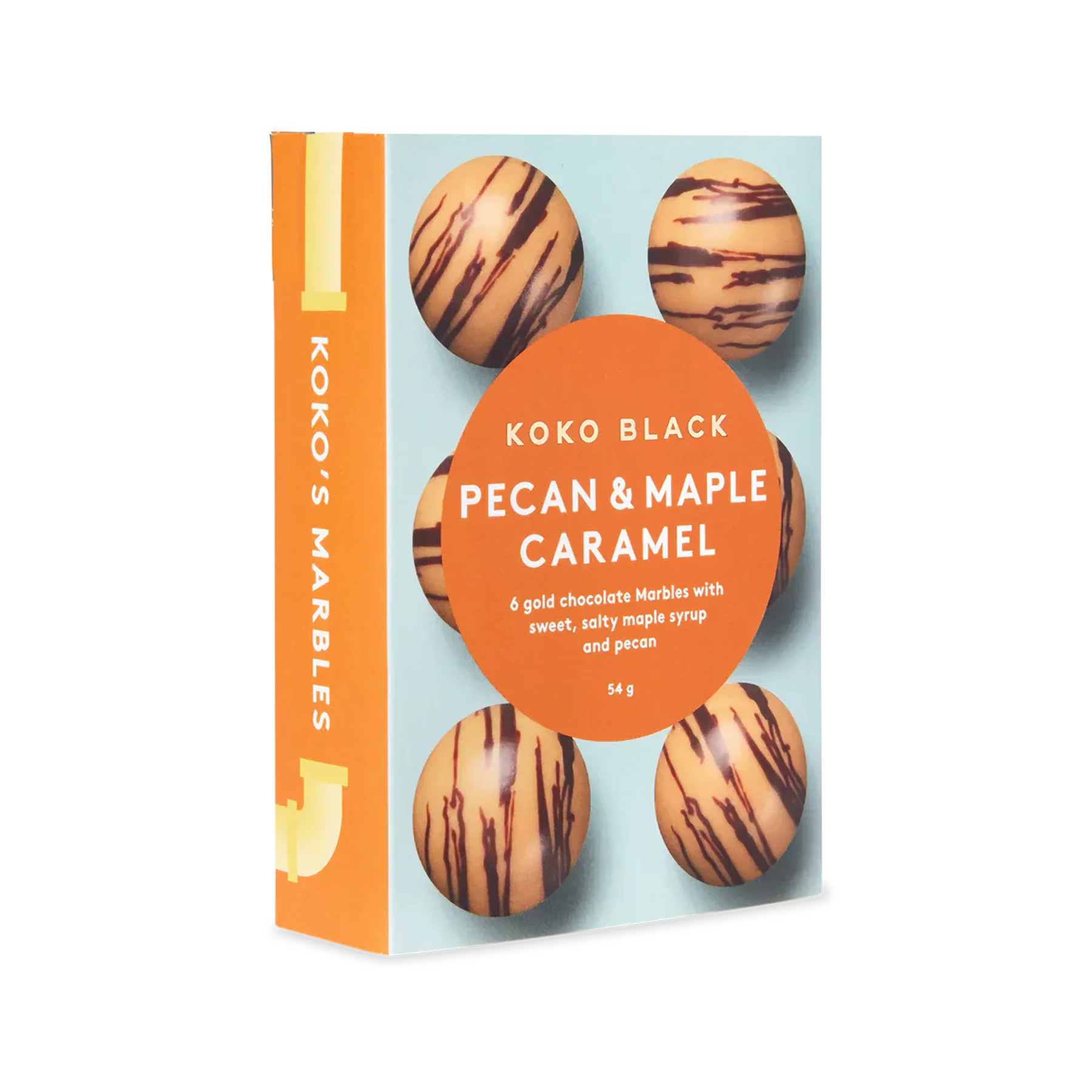 Koko Black Pecan & Maple Caramel chocolate box with marbled design on a light blue background