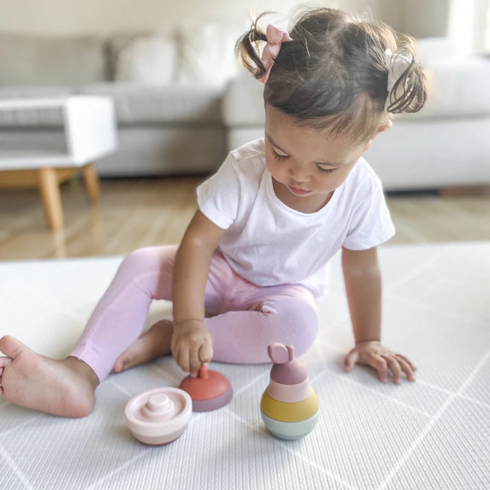 Living Textile Stacking Silicone Apple - a girl playing