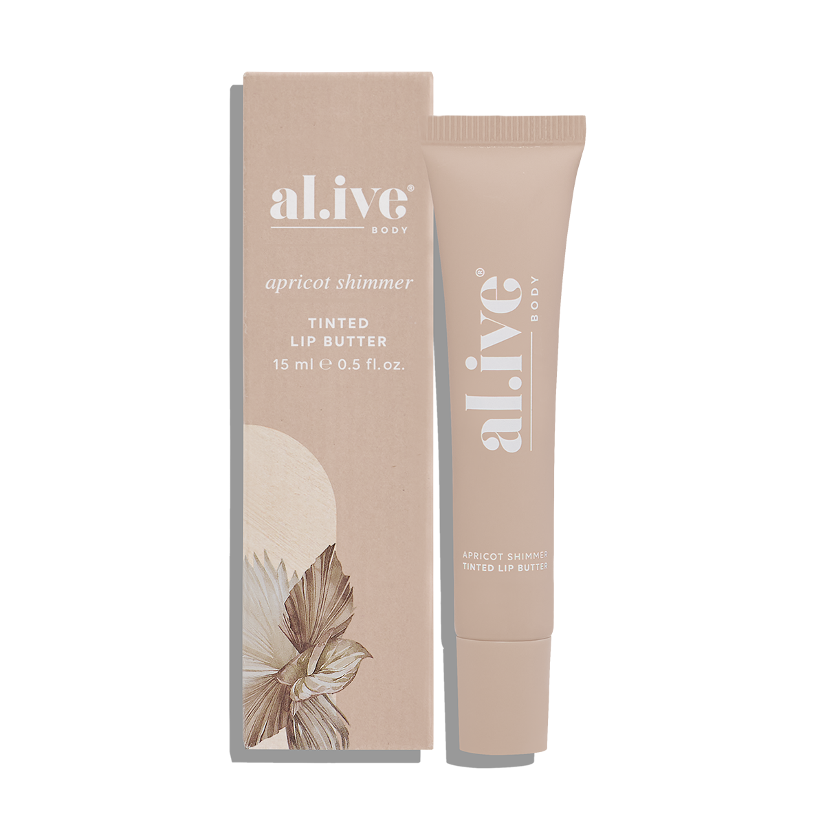 Tinted lip butter with packaging on a white background