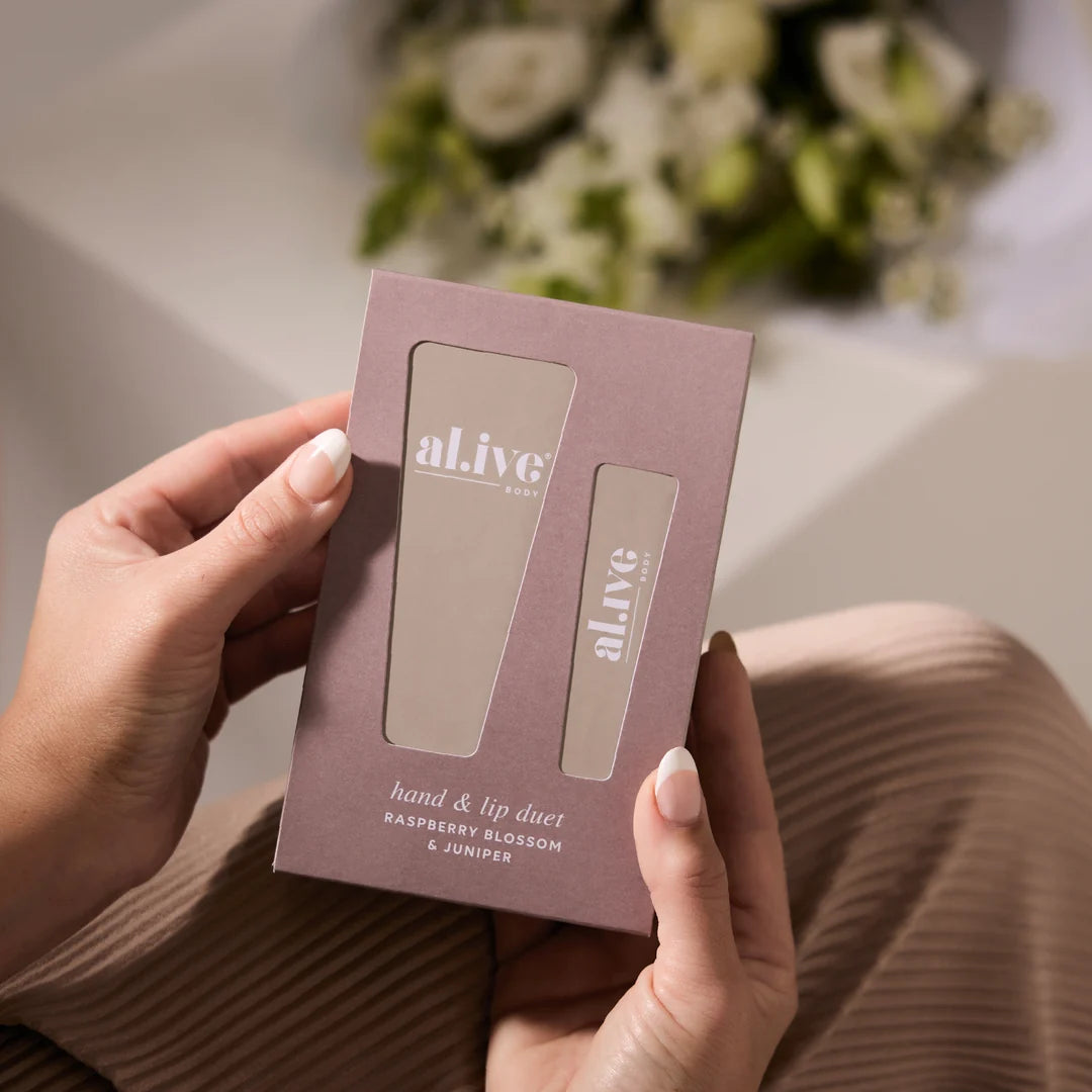 hands holding alive hand and lip duet raspberry blossm & juinper