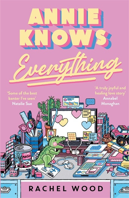 Book cover of 'Annie Knows Everything' with colorful text and a vibrant illustration of a desk.