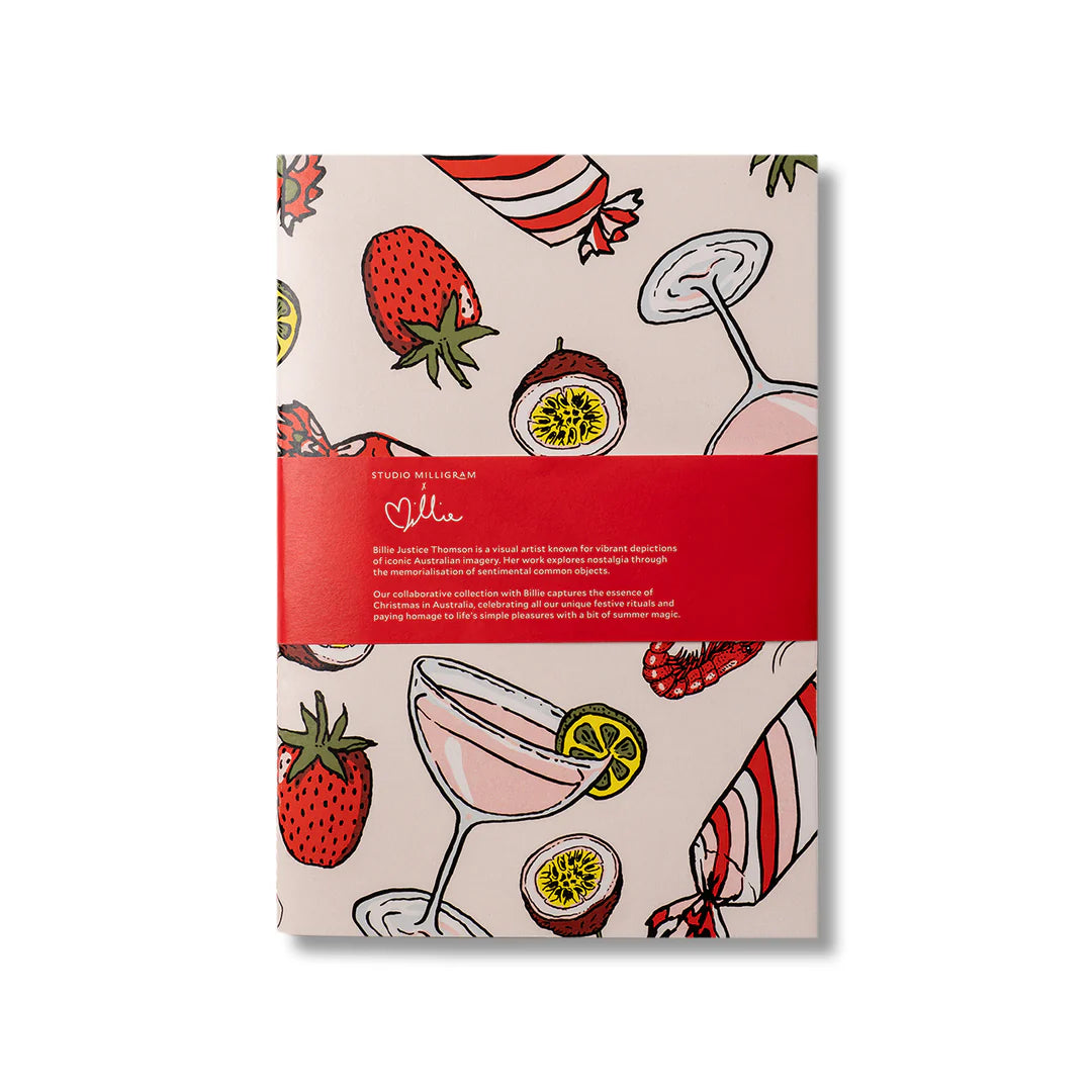 Notebook with a red ribbon and drink-themed cover design on a white background